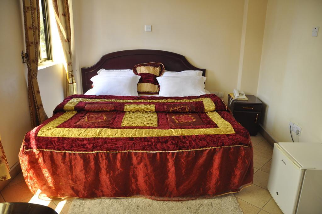 Rich Hotel Arusha Cameră foto