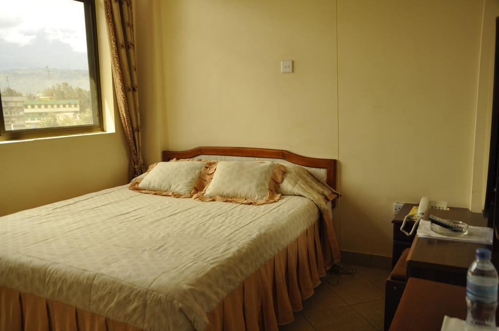 Rich Hotel Arusha Cameră foto